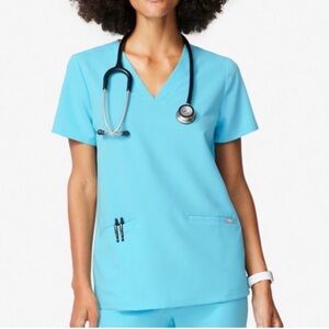 Figs casma three pocket scrub top neon blue